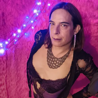 independant trans escort joy in a purple lingerie body